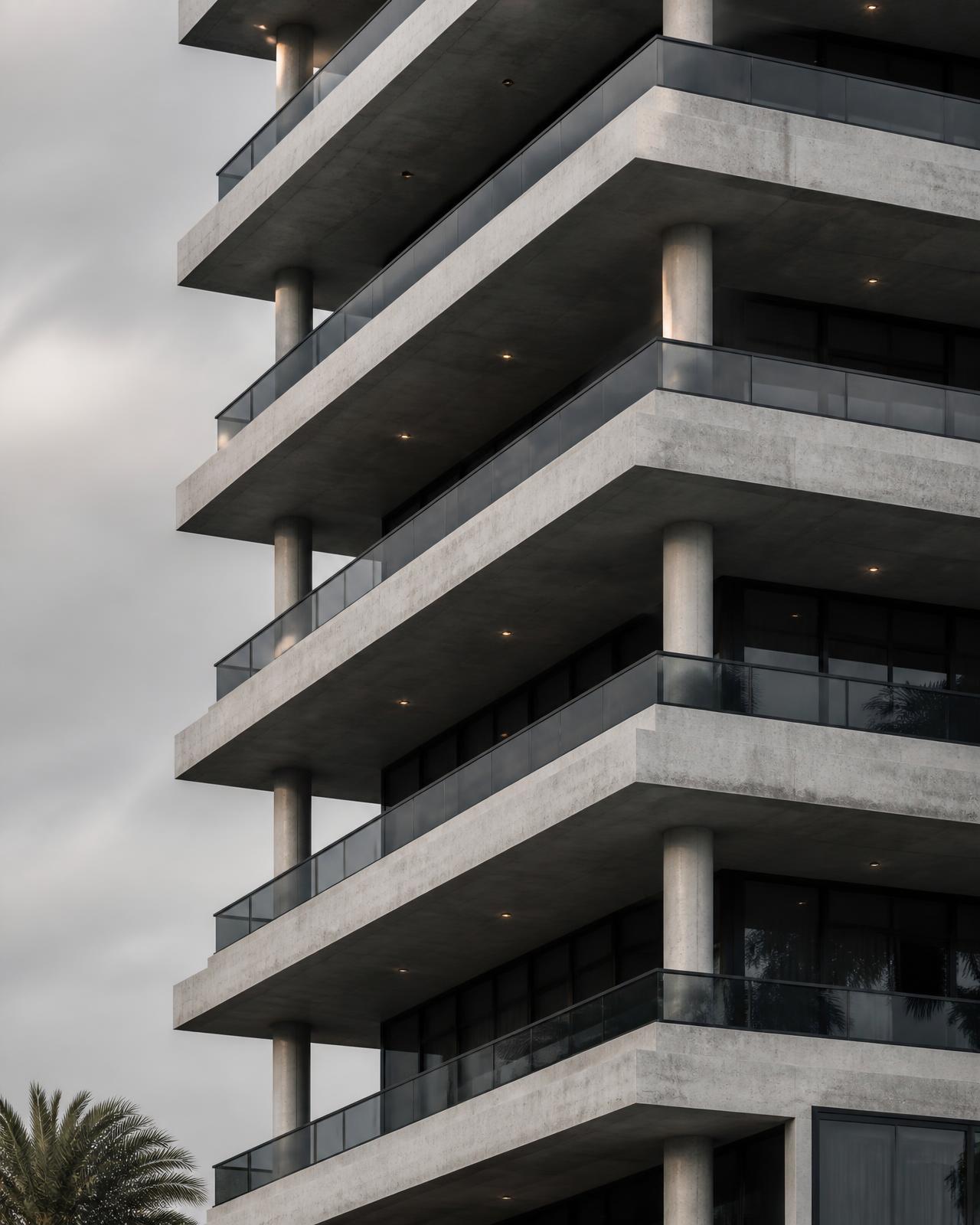 South Florida concrete condominium tower showing stacked balcony slabs and façade concrete